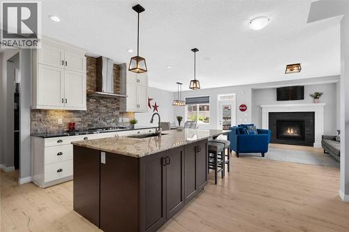 103 Masters Rise Se, Calgary, AB - Indoor Photo Showing Kitchen With Upgraded Kitchen