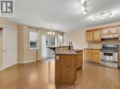 Kitchen + Dining - 60 Sherwood Way Nw, Calgary, AB - Indoor Photo Showing Kitchen