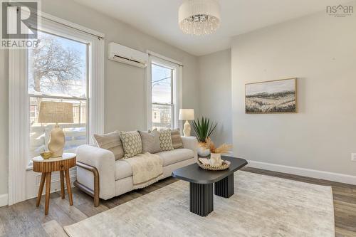 Efficient ductless heat pump for heating & cooling - 2542 Gottingen Street, Halifax, NS - Indoor Photo Showing Living Room