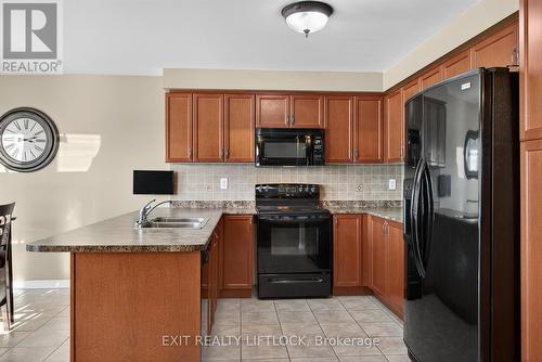 1403 Ireland Drive, Peterborough (Monaghan Ward 2), ON - Indoor Photo Showing Kitchen With Double Sink