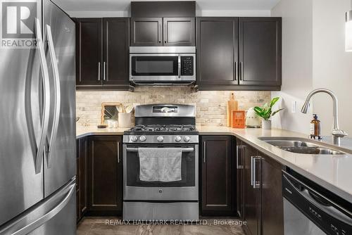 302 - 106 Bard Boulevard, Guelph, ON - Indoor Photo Showing Kitchen With Double Sink With Upgraded Kitchen