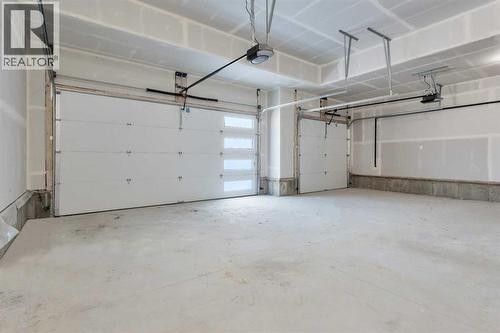 19 Everson Close, Red Deer, AB - Indoor Photo Showing Garage