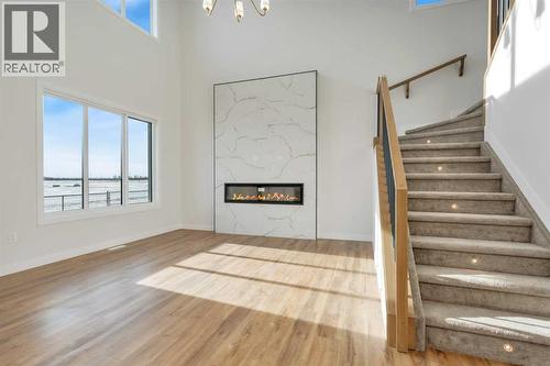 19 Everson Close, Red Deer, AB - Indoor Photo Showing Other Room With Fireplace