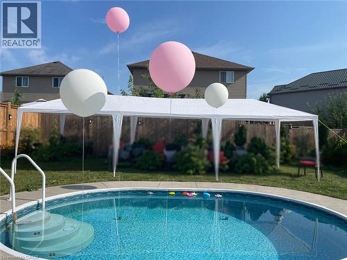 32 Hudson Drive, Cayuga, ON - Outdoor With Above Ground Pool With Backyard