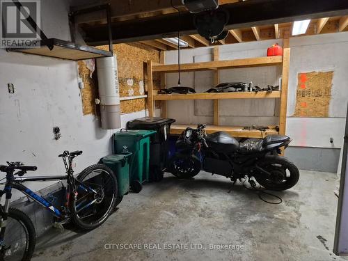 Single garage - 60 Castlewood Place, Cambridge, ON - Indoor Photo Showing Garage