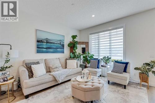 145 Lucas Crescent Nw, Calgary, AB - Indoor Photo Showing Living Room