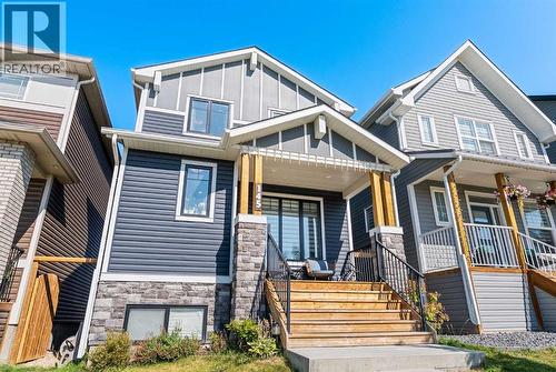 145 Lucas Crescent Nw, Calgary, AB - Outdoor With Facade