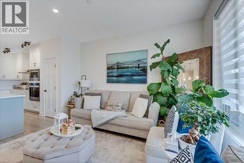145 Lucas Crescent Nw, Calgary, AB - Indoor Photo Showing Living Room