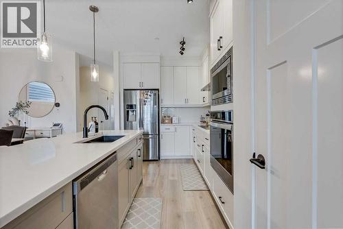 145 Lucas Crescent Nw, Calgary, AB - Indoor Photo Showing Kitchen With Upgraded Kitchen