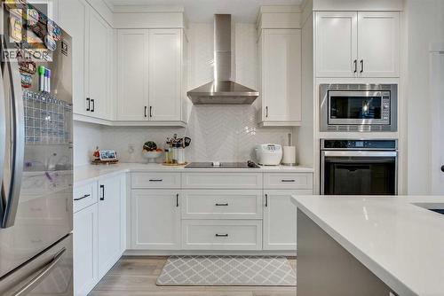 145 Lucas Crescent Nw, Calgary, AB - Indoor Photo Showing Kitchen With Upgraded Kitchen