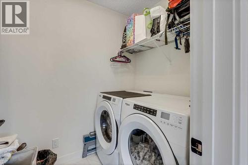 145 Lucas Crescent Nw, Calgary, AB - Indoor Photo Showing Laundry Room