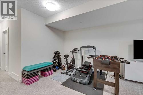 145 Lucas Crescent Nw, Calgary, AB - Indoor Photo Showing Gym Room