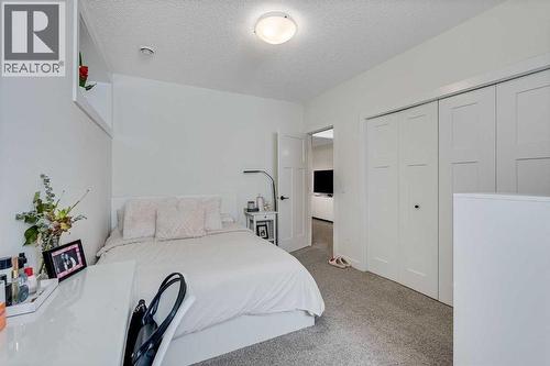 145 Lucas Crescent Nw, Calgary, AB - Indoor Photo Showing Bedroom