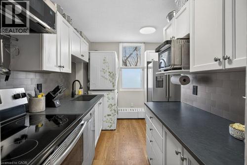 350 Quigley Road Unit# 232, Hamilton, ON - Indoor Photo Showing Kitchen With Upgraded Kitchen