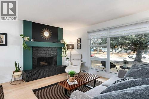 10219 Maplebrook Place Se, Calgary, AB - Indoor Photo Showing Living Room With Fireplace