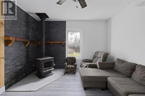 2521 U Line Rd, Hilton, ON - Indoor Photo Showing Living Room With Fireplace