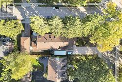 Over head shot shows both driveways. 8+ parking - 
