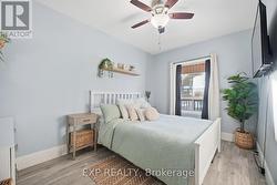Primary bedroom overlooks the front yard - 