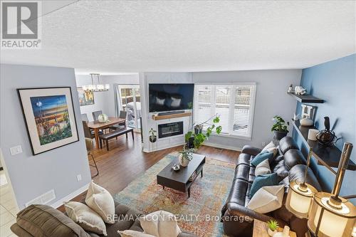 361 Sienna Crescent, Kitchener, ON - Indoor Photo Showing Living Room With Fireplace