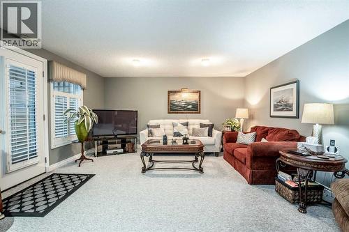 Bright west facing family room - 509 Highview Point Nw, High River, AB - Indoor Photo Showing Living Room