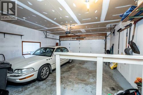 Double attached garage - 509 Highview Point Nw, High River, AB - Indoor Photo Showing Garage
