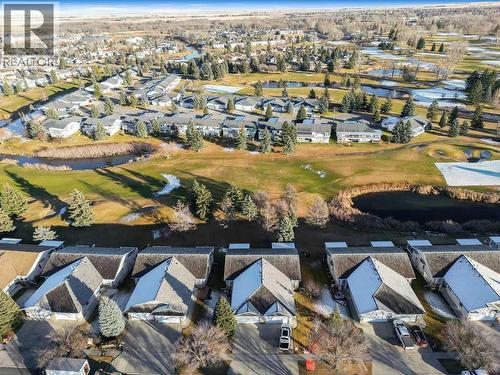 Park-like setting all year round - 509 Highview Point Nw, High River, AB - Outdoor With View