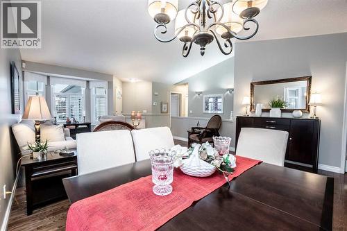 Vaulted ceiling - 509 Highview Point Nw, High River, AB - Indoor Photo Showing Dining Room