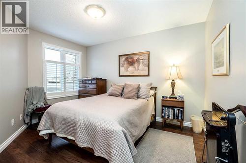 2nd Bedroom/Den - 509 Highview Point Nw, High River, AB - Indoor Photo Showing Bedroom