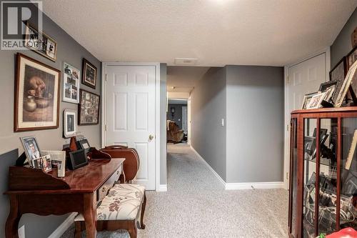 Hobby area - basement - 509 Highview Point Nw, High River, AB - Indoor Photo Showing Other Room