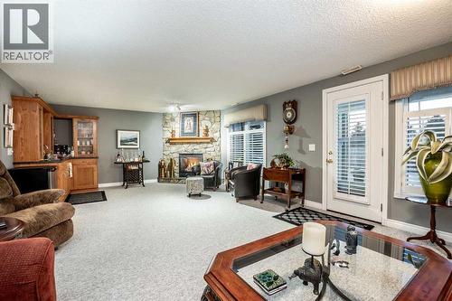 Great room to entertain - 509 Highview Point Nw, High River, AB - Indoor Photo Showing Living Room With Fireplace