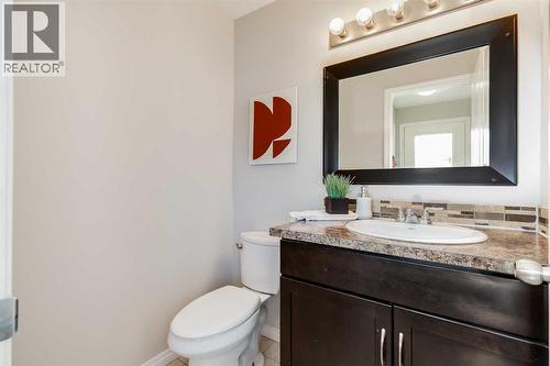 Powder room - 292 Falton Drive Ne, Calgary, AB - Indoor Photo Showing Bathroom