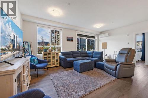 117, 30 Walgrove  Se, Calgary, AB - Indoor Photo Showing Living Room