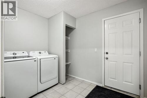 104 Cove Crescent, Chestermere, AB - Indoor Photo Showing Laundry Room
