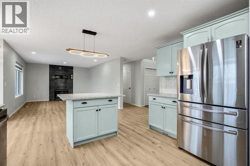 104 Cove Crescent, Chestermere, AB - Indoor Photo Showing Kitchen With Stainless Steel Kitchen