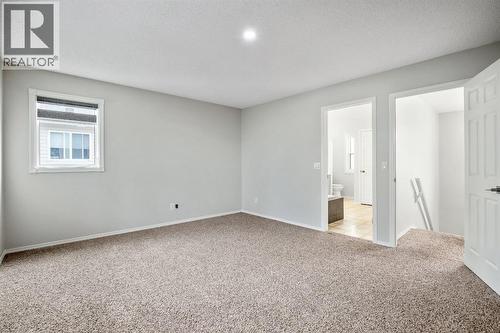 104 Cove Crescent, Chestermere, AB - Indoor Photo Showing Other Room