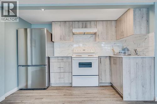 104 Cove Crescent, Chestermere, AB - Indoor Photo Showing Kitchen