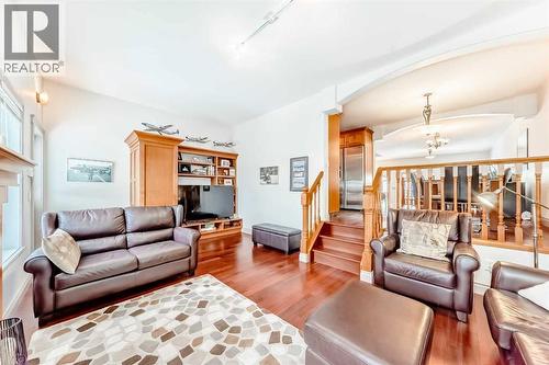 252 18 Avenue Nw, Calgary, AB - Indoor Photo Showing Living Room With Fireplace