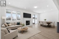 Great room & dining room - virtually staged - 