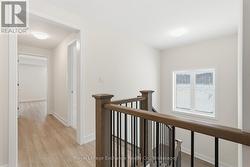 Hallway leading to primary bedroom - 