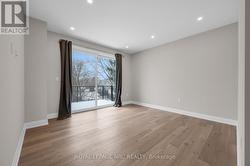 Primary Bedroom with Balcony - 