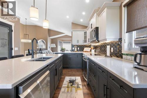 164 Hillcrest Boulevard, Strathmore, AB - Indoor Photo Showing Kitchen With Double Sink With Upgraded Kitchen