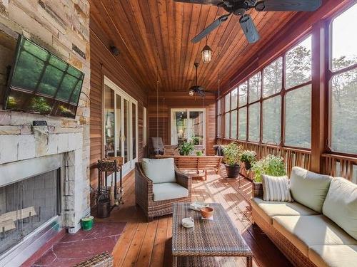 Veranda - 199 Ch. Du Mont-Écho, Lac-Brome, QC - Indoor Photo Showing Living Room With Fireplace