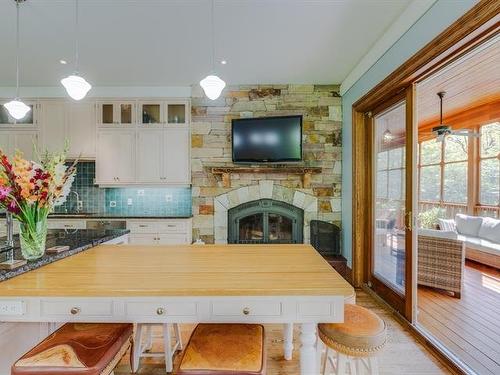 Kitchen - 199 Ch. Du Mont-Écho, Lac-Brome, QC - Indoor Photo Showing Other Room With Fireplace