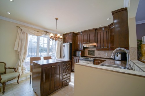 Kitchen - 10625 Boul. Des Mille-Îles, Laval (Saint-François), QC - Indoor Photo Showing Kitchen With Double Sink