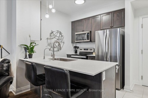 150-16 Concord Place, Grimsby, ON - Indoor Photo Showing Kitchen With Stainless Steel Kitchen