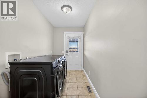 31 Valarosa Drive, Didsbury, AB - Indoor Photo Showing Laundry Room