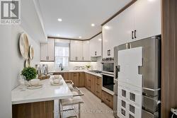 18 CONNAUGHT AVENUE  Toronto, ON M4L 2V9