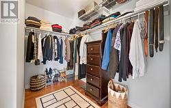 Primary Bedroom Walk in Closet - 