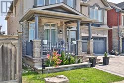 Front Patio With Seating Area & Raised Garden bed - 