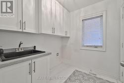 Mudroom From Garage W Storage, Sink & Laundry RI - 